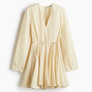 Pale Yellow Dress with Flared Skirt